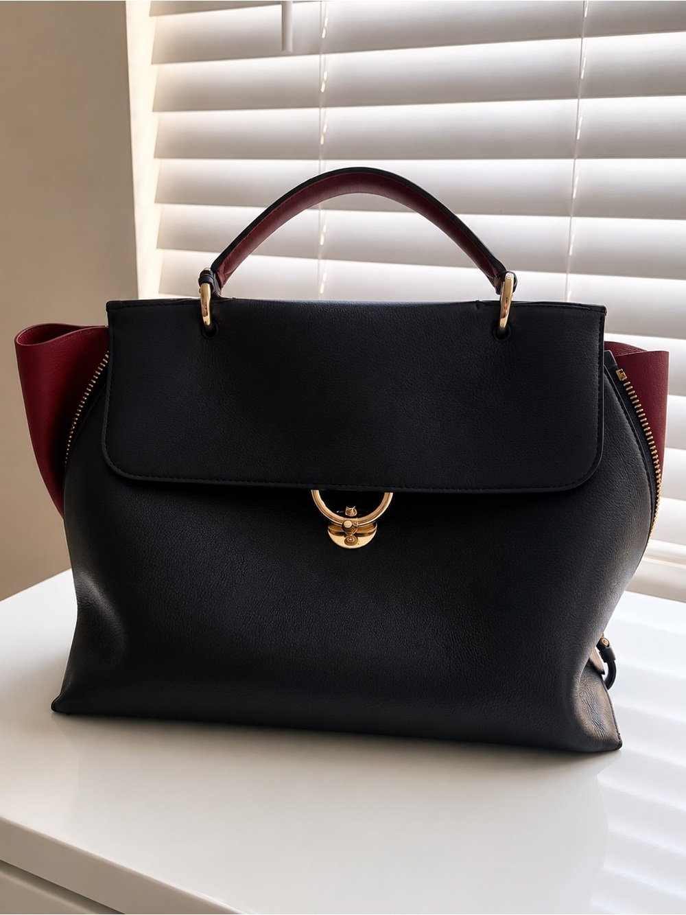 Salvatore Ferragamo Black and Burgundy Top-Handle Women's Bag with Gold Hardware - Picture 1 of 6